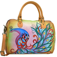 Load image into Gallery viewer, Anna by Anuschka style 8067, handpainted Large Zip Around Satchel. Royal Peacock painting in tan color. Featuring inside zippered wall pocket, cell and multi purpose pocket, Removable strap, Fits Laptop.
