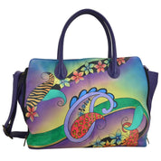 Anna by Anuschka style 8129, handpainted Large Expandable Tote. Paisley Collage Eggplant painting in purple color. Featuring double magnetic closure entry to main compartment, Removable strap, Fits tablet.