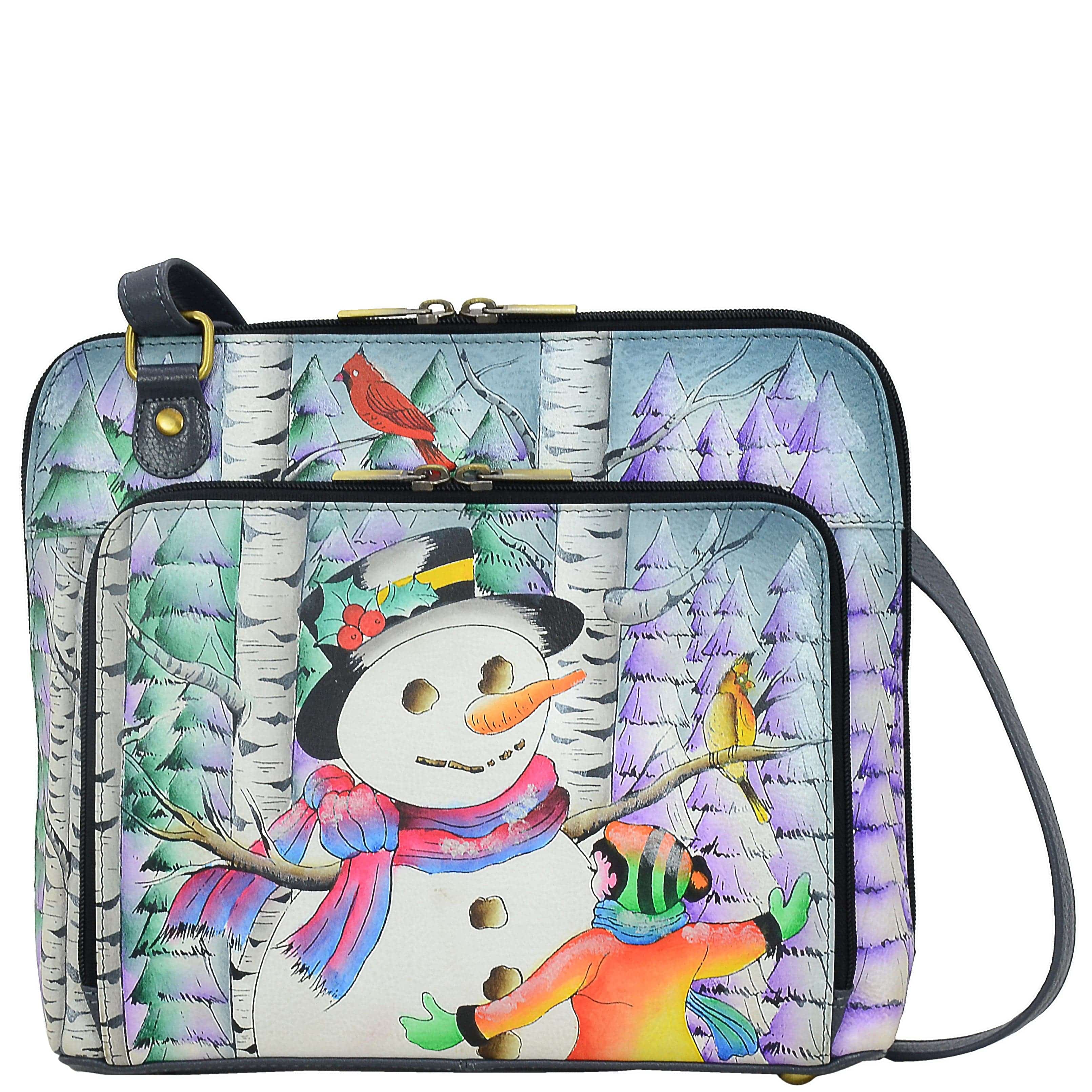 Anna by Anuschka style 8278, handpainted Zip Around Organizer. Boy and The Snowman painting in grey color. Featuring front Organizer compartment with Twelve credit card pocked, two ID window and one zippered pocket.